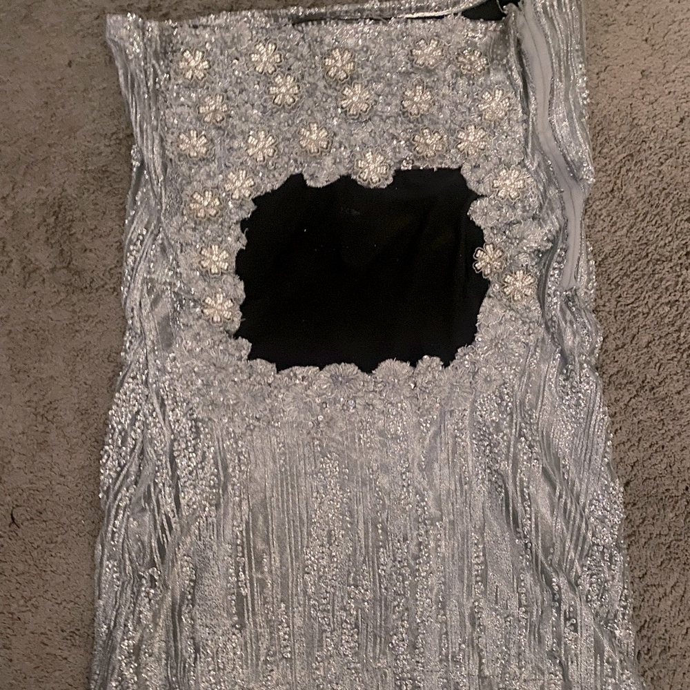 Silver sparklie dress with cut out for a princess!